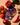 Peri peri tandoori spice blend packet surrounded by vegetables on a beige background